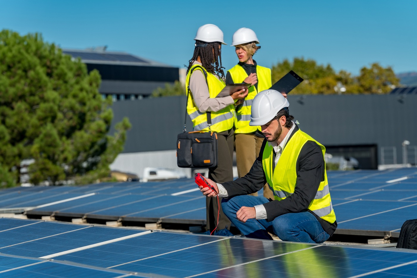 Canadian Energies EPC engineers commissioning a rooftop solar array